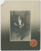Retrato de una mujer leyendo.